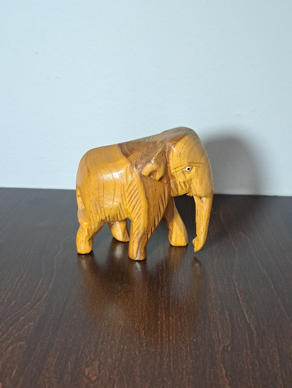 Handcrafted Wooden Elephant Sculpture in Warm Yellow Finish